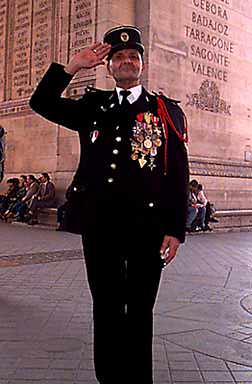 Photo of a Veteran French Soldier at the Arc de Triomphe